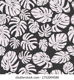 Silhouettes of monstera leaves. Seamless pattern. Vector illustration. Ideal for printing onto fabric, scrapbooking paper, gift wrap and wallpaper, etc.