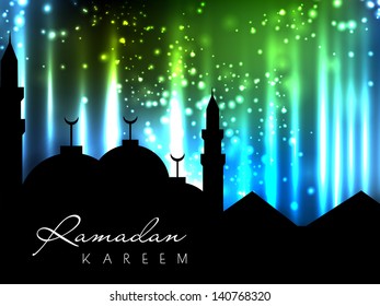 Silhouettes of Mosque on shiny abstract background for Ramadan Kareem.