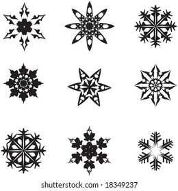 Silhouettes de nueve copos de nieve diferentes