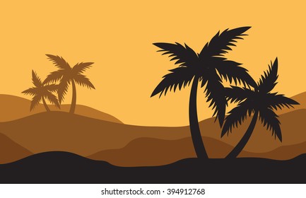 Silhouettes of palms in the desert