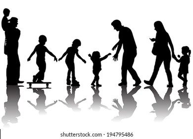 Silhouettes of parents with kids in the park