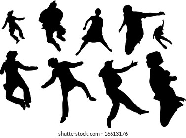 silhouettes of a people jumping