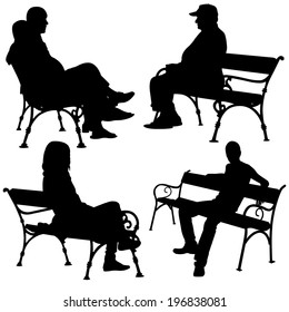 silhouettes of people on benches