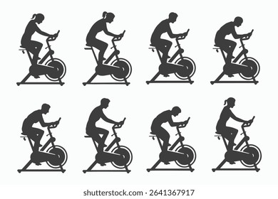 Silhouettes of people on stationary bikes exercising