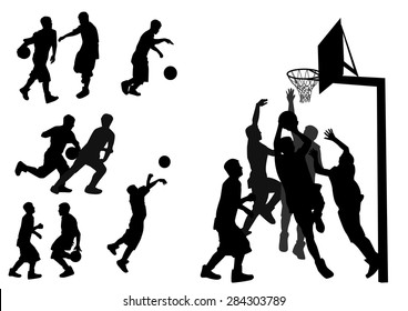 silhouettes of people playing basketball