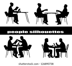 silhouettes of people at a table