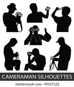 Silhouettes of people taking pictures
