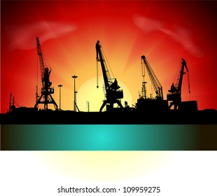 Silhouettes of port constructions on sunset