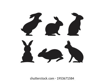 Silhouettes of rabbits isolated on a white background. Rabbits in various poses