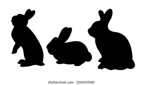 Silhouettes of rabbits isolated on a white background. Black outline bunny icon set.
