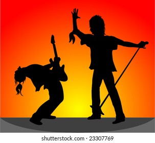 Silhouettes of rock musicians at a concert. The singer and the guitarist.