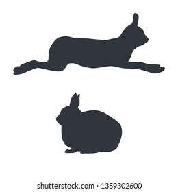 Silhouettes of running and sitting cute polar hares isolated on white background. Vector illustration EPS 8