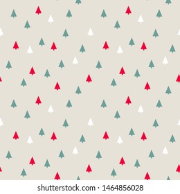 Silhouettes of small stylized Christmas trees . Seamless background Vector illustration