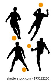 Silhouettes of soccer players