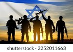 Silhouettes of soldiers against the sunrise and Israel flag. Concept - armed forces of Israel. EPS10 vector