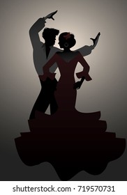 Silhouettes of Spanish couple flamenco dancers. 