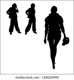 Silhouettes of sports young three women girls two in pants one in shorts view from back goes barefoot in hands shoes, long legs,