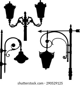 silhouettes of streetlights