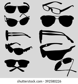 Silhouettes of sunglasses on a gray background