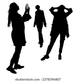 Silhouettes of three female figures isolated on a white background. A girl with a phone takes a selfie, two people pose. Vector illustration