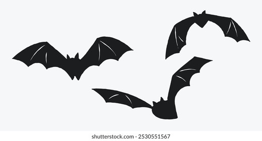 Siluetas de tres murciélagos voladores sobre un fondo claro. Ilustraciones simples de murciélago negro. Concepto de decoración de Halloween para el diseño y la impresión.