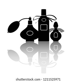 Silhouettes of three perfumes. Vector illustration. Eps 10