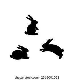 Silhouettes of three rabbits in motion