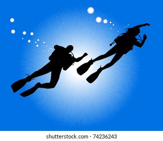 silhouettes of two divers swimming against the background of blue water