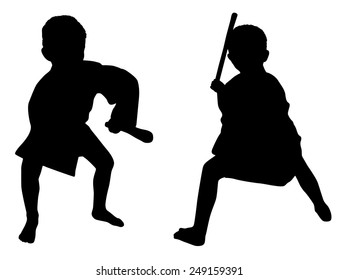 Silhouettes of two little boys who playing karate with stick