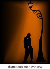 Silhouettes of two lovers under a lantern