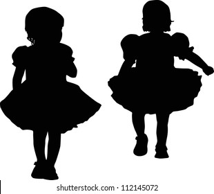 Silhouettes of two small girls