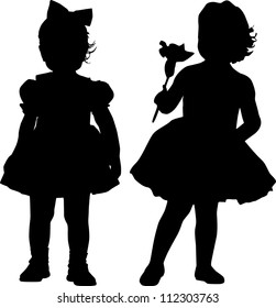 Silhouettes of two small girls