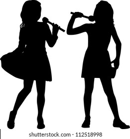 Silhouettes of two small girls