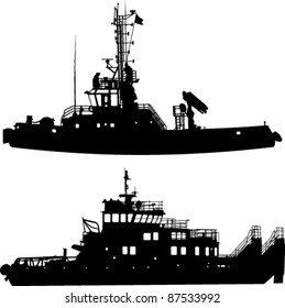 Silhouettes of two towboat