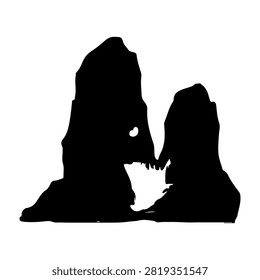 Silhouettes of two towering rock formations with water in the foreground, creating a dramatic and natural landscape scene.