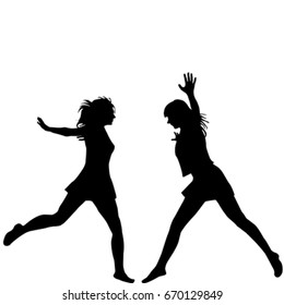 Silhouettes of two woman jumping on white background