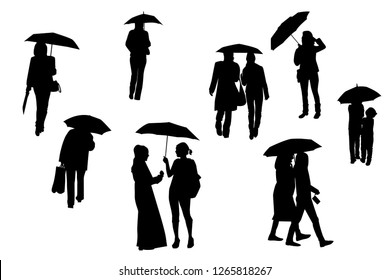 Silhouettes of walking people under the umbrellas, vector, set.