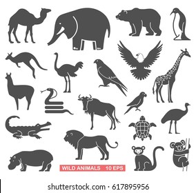 Silhouettes of wild animals and birds. Vector icons