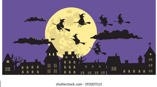 Silhouettes of witches flying on their brooms over the city at night on Halloween