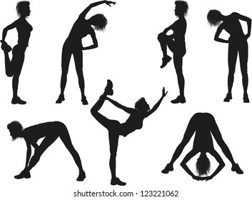 Silhouettes of a woman doing sport exercises