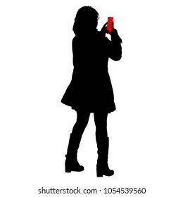 Silhouettes woman taking selfie with smartphone on white background