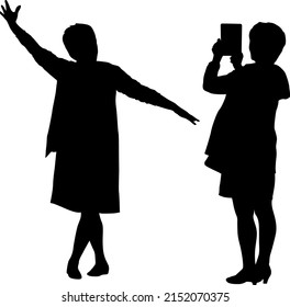 Silhouettes woman taking selfie with smartphone on white background