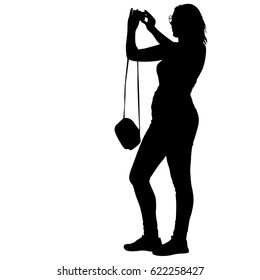 Silhouettes woman taking selfie with smartphone on white background.