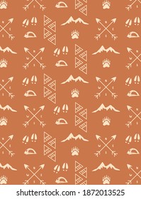 Silhouettes of woodland elements like mountains, tents, arrows with bear and deer foot prints.
