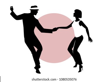 Silhouettes of young couple dancing 