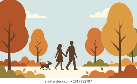 Silhouettes of a young couple walking their dog in a beautiful autumn park with yellow and orange trees under a clear light blue sky.