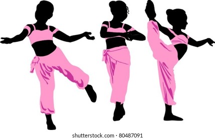 silhouettes of young girls in eastern dance poses