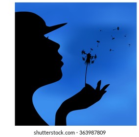 silhoute Girl blowing flower at night