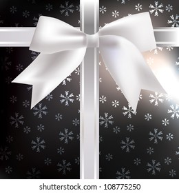 Silk bow on the abstract background