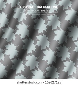 Silk fabric silver color with ornament silhouette of the maple leaf. Drapery Textile Background. Vector EPS 10 illustration. Drapery Textile Background. Vector EPS 10 illustration.